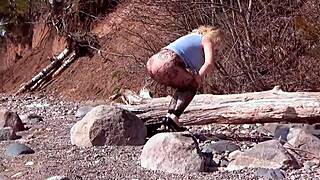 fishnet pantyhose highlighting a big ass in nature