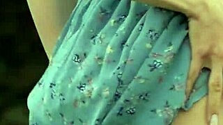 slim milf adel morel poses outdoors, exposing small tits?