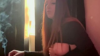 Artemisia Love dives into steamy solo dildo action. She smokes a cigarette during the fetish play.