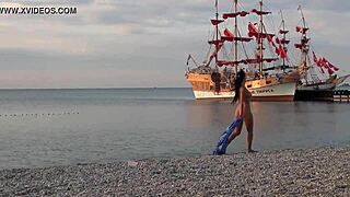 this milf is strolling nude in public, flashing passersby like a naughty exhibitionist