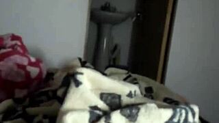 In a dominant scene, the milf gives an intense footjob while teasing her pussy.