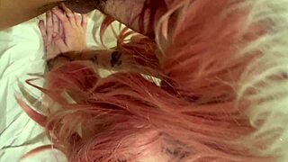 bold pink haired babe in straight jacket shows off long hair and cute european style with friends