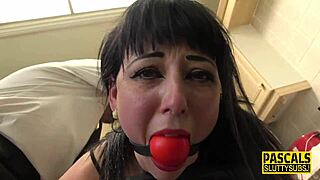 Why is Pascal White whipping this dominated milf in stockings during hardcore bdsm session?