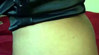 ebony milf playing with a vibrator then pees on her self!