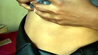 ebony milf playing with a vibrator then pees on her self!