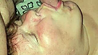 Milf engages in sucking a hard cock with focused intensity