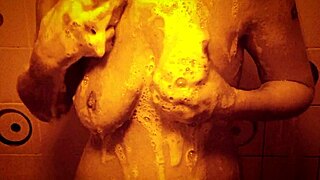 Wow, check out this sexy slow mo shower with horny milf massaging her wet tits and nipples!