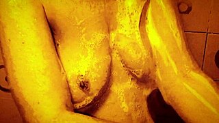 Wow, check out this sexy slow mo shower with horny milf massaging her wet tits and nipples!