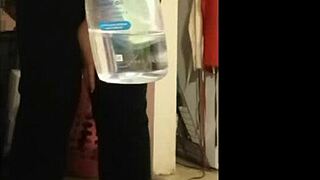 Curvy bbw milf model oils up fat body in solo striptease, teasing as slut with wet skin and ripped clothes for webcam show.