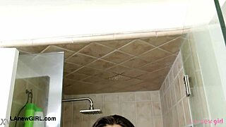 Captivating brunette beauty takes a shower before casting interview