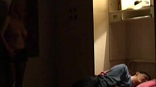 In this scene, a busty mom with big tits engages with her son who has a huge cock.