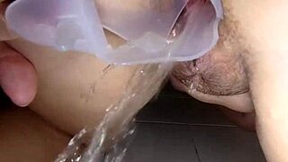 Public shower with peeing and vaginal dilator use