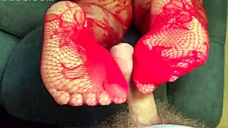 Bbw milf gives footjob in red lace stockings and black panties!