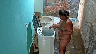Hidden camera catches milf stepmom bathing then flashing big natural tits in private yard