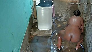 Hidden camera catches milf stepmom bathing then flashing big natural tits in private yard