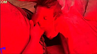 Watch this curvy latina milf under red light as she licks balls, spits on huge cock for handjob, and takes massive facial cumshot.