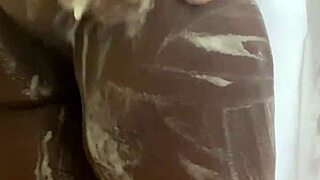 Squirting ebony BBW washes big ass with toys in sexy fat milf session