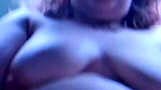 my wife sets up the camera in our bedroom and starts touching herself slowly, building up to a shaking orgasm all alone