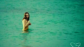 Olive Gee and her blonde girlfriend share intimate moments on the bed with kissing and muff diving.