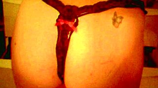 Wife in thongs gets a tribute with cumshot focus