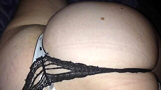 Wife in thongs gets a tribute with cumshot focus