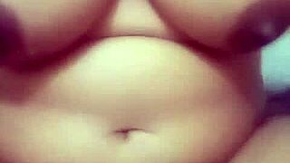 indian village girl spreads shaved wet pussy for solo masturbation close-up. she licks fingers and moans in country ranch setting for hardcore fun.