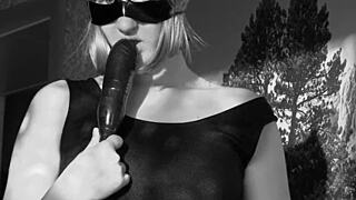 Milf in dress and stockings masturbates with dildo showing big ass and tits in homemade black and white fetish