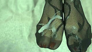 blonde milf gives amazing footjob with fishnets and hairy pussy