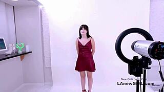 I feel so excited as a radiant brunette muse attending my modeling audition with casting directors and photographers on the sofa