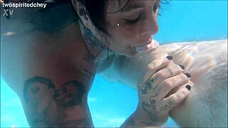 holiday threesome in the pool with big tits blonde and brunette milfs fingering wet pussies uh i mean licking