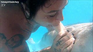 holiday threesome in the pool with big tits blonde and brunette milfs fingering wet pussies uh i mean licking