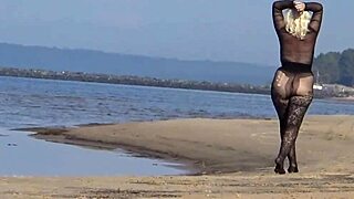 Black style blonde milf flashing big natural tits and big ass on the beach in pantyhose and heels