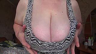 big gorgeous tits of chubby bbw milf swing in close-up view during her solo session