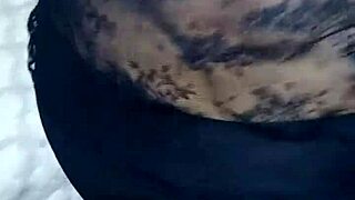 señora with big ass in shiny spandex leggings shows off her curves