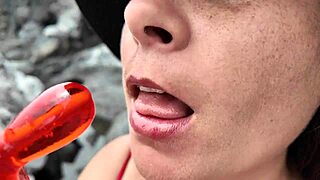Stepmom sensually sucks candy on beach then practices blowjob skills on stepson's cock