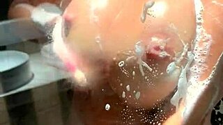 Busty Shower Fantasy with Lenushka Doll Submerged in Bubbles Suggesting Wet Curves