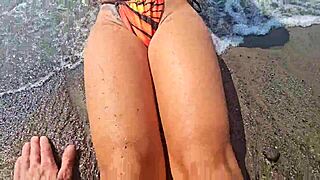 Voyeurs Chat with Passers-By on Beach