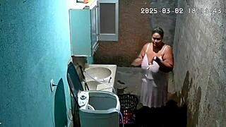 Hey, check out this hidden camera catching the Brazilian neighbor masturbating in the backyard while her father-in-law watches!