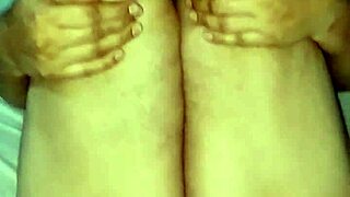 My hot wife poses elegantly in casual attire.