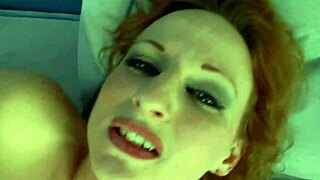 This redhead milf has such vibrant hair and a friendly smile that lights up the room