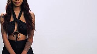 September Reign strokes her huge fake tits in passionate solo play