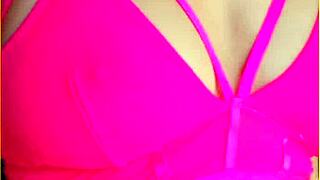 wifey rocks hot pink lingerie flashing her perfect big tits around the house