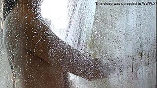 Redhead milf in shower rubs coffee over pussy—what naughty secrets spill next?