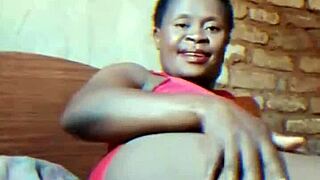 Hubby gone—watch this sexy African milf finger her dripping wet pussy teasingly!