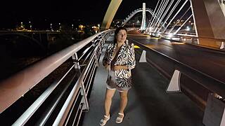 oh man luscious milf struts braless pantyless on bridge flashing huge tits