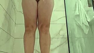 jurels spreads shaved milf pussy and fat ass in steamy shower bath