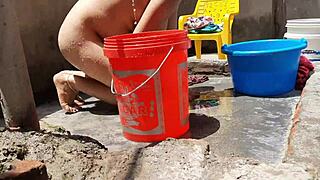 Village Bhabhi Bathes Outdoors Flashing Big Boobs Pussy