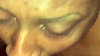 Ebony milf slurps sloppy cum from massive black cock deepthroat