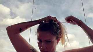 Tattooed woman nearly kicked from gym for see-through top with hard wet nipples