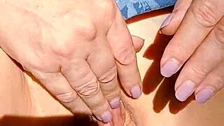 HORNY MATURE WIFE SPREADS SHAVED CUNT IN THONG PANTIES